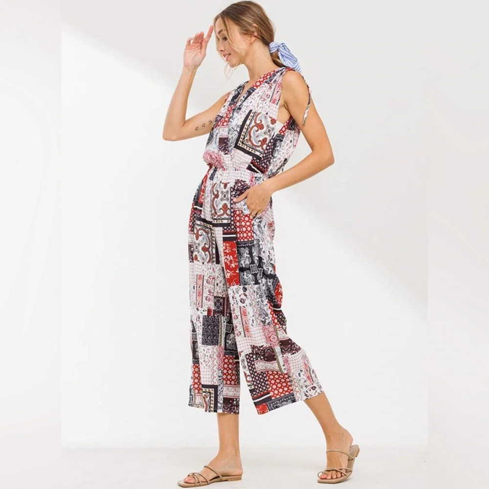 D231 Women’s Sleeveless V-Neck Surplice Multi Print Jumpsuit with Pockets